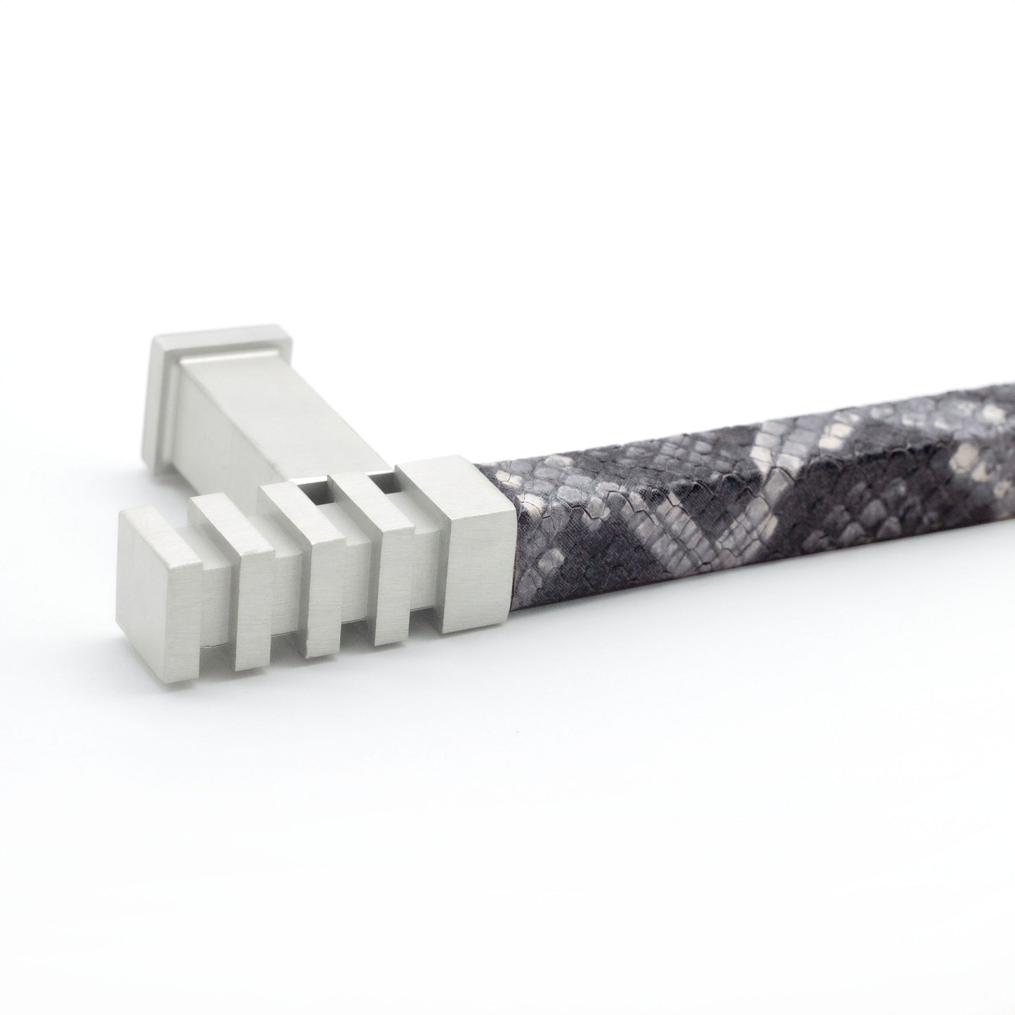 Handcrafted Adelina Pull by Di Lusso with satin finish and grey snake leather, luxury hardware made in the USA, featuring a unique grooved design, perfect for cabinets and drawers.
