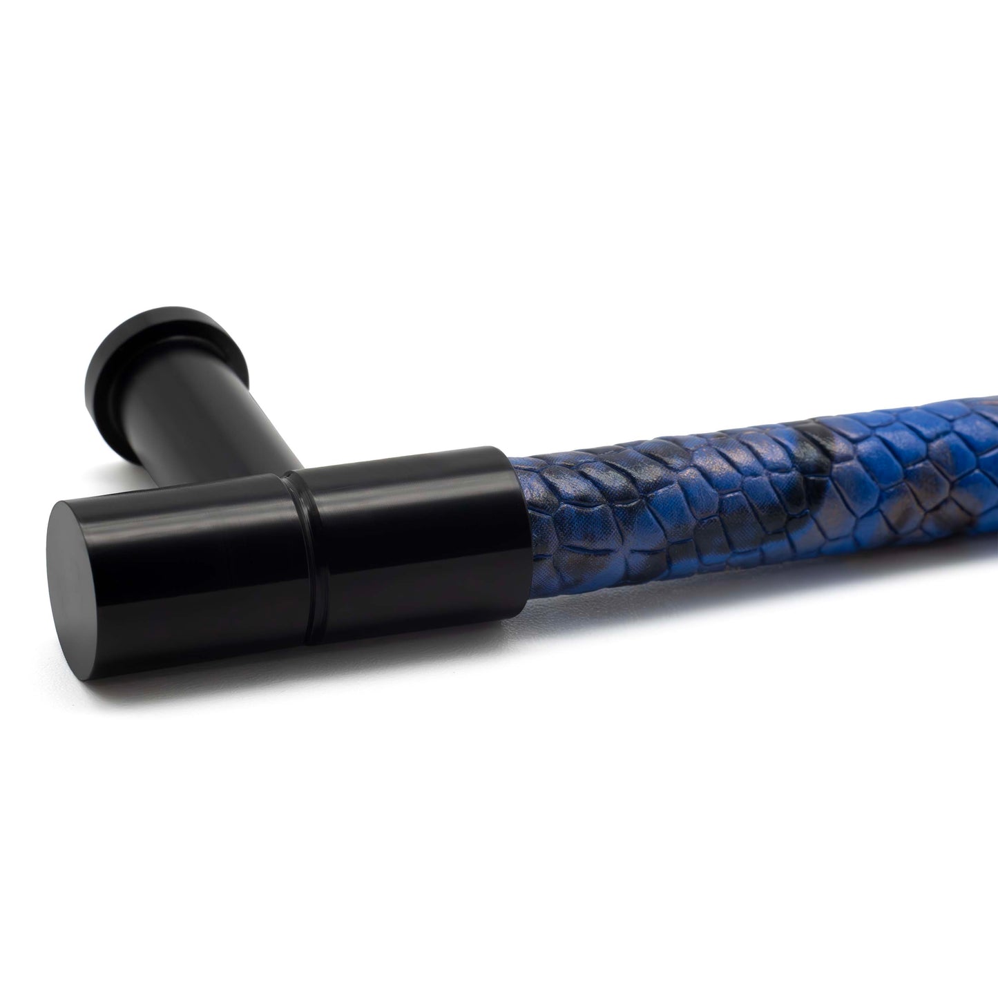 Luxury pull by Di Lusso Hardware with black finish and Snake Blue Milky Way leather, designed for cabinets and drawers.