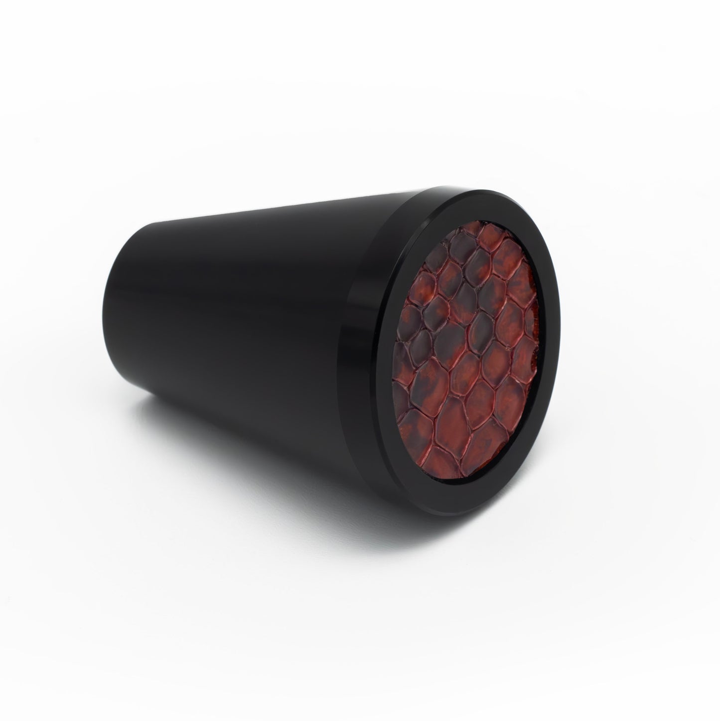 Handcrafted Retro knob by Di Lusso with black finish and red and black snake leather, luxury hardware made in the USA, perfect for cabinets, drawers, and wardrobes, ideal for contemporary, Art Deco, industrial, and eclectic interiors.